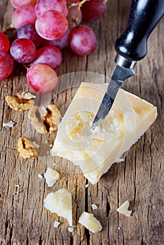 Grana padano- Chunk of parmesan cheese photo