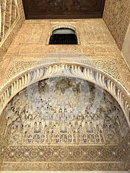 Granada, Spain - December 30, 2019: Arabic pattern texture in Alhambra interior details