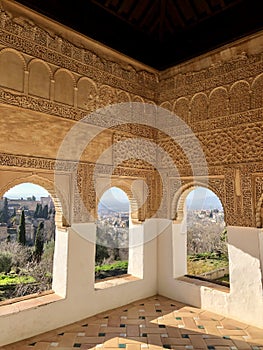 Granada, Spain - December 30, 2019: Arabic pattern texture in Alhambra interior details