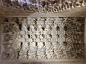 Granada, Spain - December 30, 2019: Arabic pattern texture in Alhambra interior details