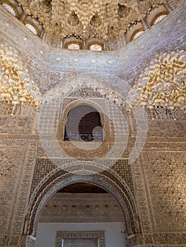 GRANADA, SPAIN - March 2018: Arches and columns of Alhambra. It is a palace and fortress complex located in Granada.