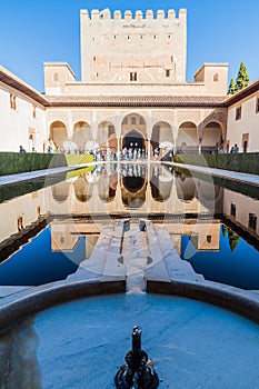GRANADA, SPAIN - NOVEMBER 2, 2017: Court of the Myrtles (Patio de los Arrayanes) at Nasrid Palaces (Palacios Nazaries) at Alhambra photo