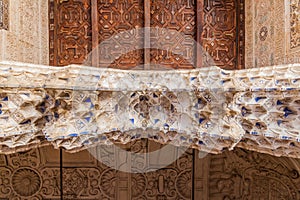 GRANADA, SPAIN - NOVEMBER 2, 2017: Detail of architecture at Nasrid Palaces (Palacios Nazaries) at Alhambra in Granada, Spa photo