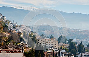 Granada town and snowy mountains of Sierra Nevada. Spain