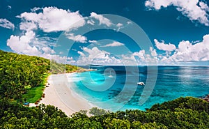 Grand Anse beach at La Digue island in Seychelles arial panoramic view. White sandy beach with blue ocean lagoon and