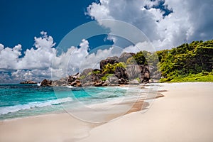 Grand anse sandy beach with azure ocean lagoon, La Digue island, Seychelles