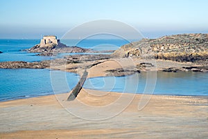 Grand Be and Petit Be islands at low tide in Saint Malo, Brittany France