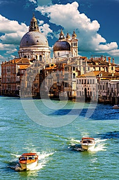 Grand Canal with Basilica di Santa Maria della Salute in Venice, Italy.