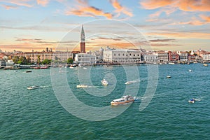 The Grand Canal and Giudecca Canal converging in front of Piazza San Marco, Campanile tower and Doge`s Palace in Venice, Italy