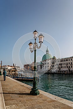 Grand Canal,Venice,Italy.Typical boat transportation.View of vaporetto station,Venetian public waterbus.Travel urban scene.Popular