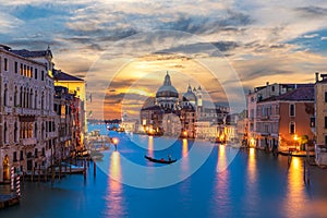 Grand Canal of Venice with a lonely gandolier at sunset, Italy