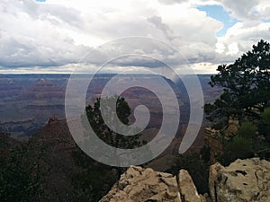 Grand Canyon with downpour in the distance