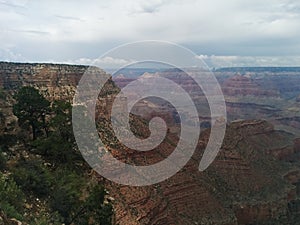 Grand Canyon landscape with distant storm clouds