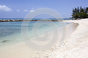 Grand Cayman Island Beach With A Wave Breaker