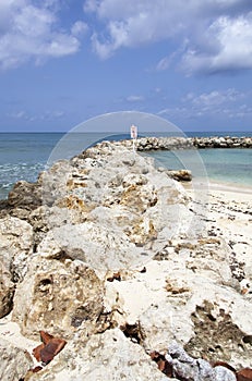 Grand Cayman Island Breakwater With Sign