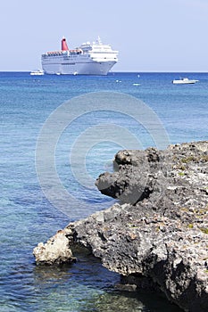 Grand Cayman Rocky Shore And A Cruise Ship