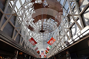 Grand Concourse decorated with international flags at O`Hare International Airport in Chicago