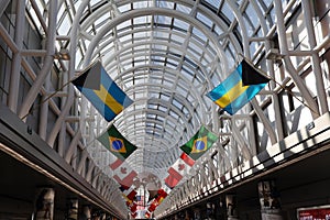 Grand Concourse decorated with international flags at O`Hare International Airport in Chicago