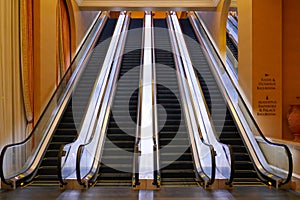 Grand escalators of a luxury hotel, leading to ballrooms with sophistication