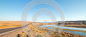 Grand Loop road next to bend in the Yellowstone river in the Hayden valley in Yellowstone National Park in Wyoming