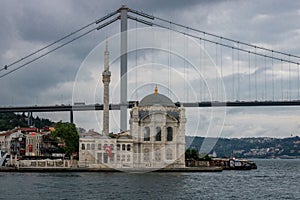 Grand Mecidiye Mosque with traditional Islamic architecture, with a bridge in the background