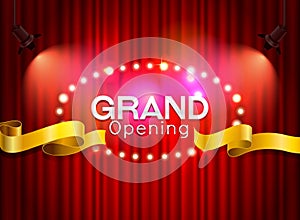 Grand opening cutting red ribbon on curtain with spot light back