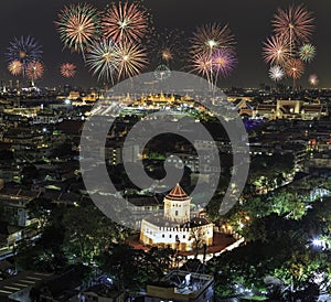 Grand palace with Beautiful Fireworks for celebration at twilight time in Bangkok, Thailand