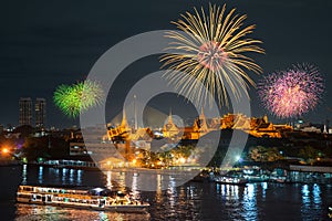 Grand palace and cruise ship in night with fireworks