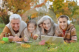 Grand parents spending time with grandchildren photo