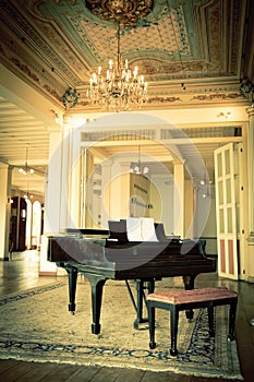 Grand piano in a old vintage luxury interior