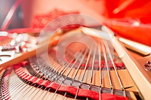 Grand piano strings. Piano inside with the shallow depth of field.