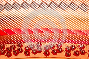 Grand piano strings. Piano inside with the shallow depth of field.