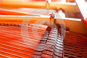 Grand piano strings. Piano inside with the shallow depth of field.