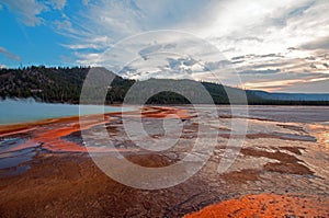 The Grand Prismatic Spring at sunset in the Midway Geyser Basin along the Firehole River in Yellowstone National Park