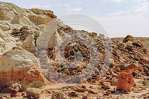 Grand Staircase-Escalante national monumen, Utah. Toadstools, an amazing balanced rock formations and silhouette of woman hiking