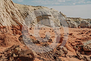 Grand Staircase-Escalante national monumen, Utah. Toadstools, an amazing balanced rock formations and silhouette of woman hiking