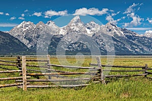 Grand Tetons and corral fence photo