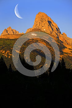 Grand Tetons and Table Mountain at Sunset with Crescent Moon