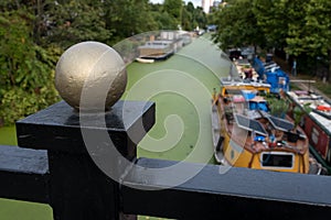 Grand Union Canal at Little Venice, Paddington, London. The water is covered in green algae after the summer heatwave, 2018