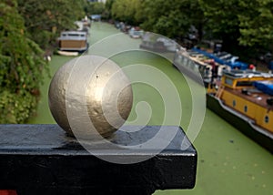 Grand Union Canal at Little Venice, Paddington, London. The water is covered in green algae after the summer heatwave, 2018