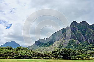 Grand view of the mountains of Kualoa Regional Beach Park at O`ahu, Hawaii, USA photo