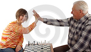 Grandad and granddaughter make a compromise in chess