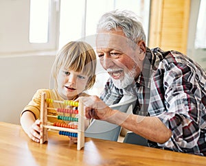 grandchild family child grandparent grandfather abacus mathematic education toy boy fun together senior finance wooden