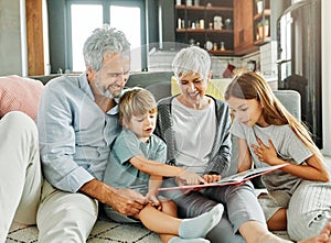grandchild family child grandparent grandfather happy together grandmother book reading read learning education story