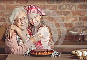 Granddaughter hug her happy grandmother