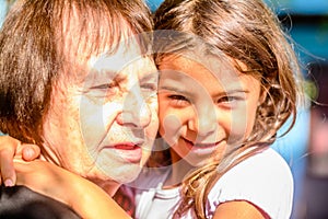 Granddaughter hugging her Grandmother