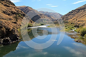 Grande Ronde River Meandering Through Rocky Hillsides photo