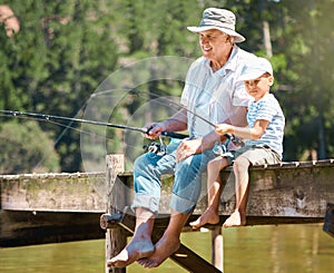 Grandfather, boy and fishing rod at lake for hobby, adventure and teaching about nature. Young child, senior man and