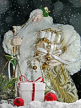 Grandfather Frost Santa Claus, St. Nicholas, Joulupukki with gifts on the background of the night frosty starry sky.