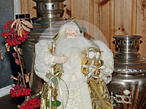 Grandfather Frost Santa Claus, St. Nicholas, Joulupukki with gifts on the background of Russian samovars. Symbol of New year